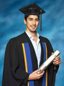 YouTuber BigBong radiates pride in academic regalia, while holding his diploma during a memorable graduation ceremony.