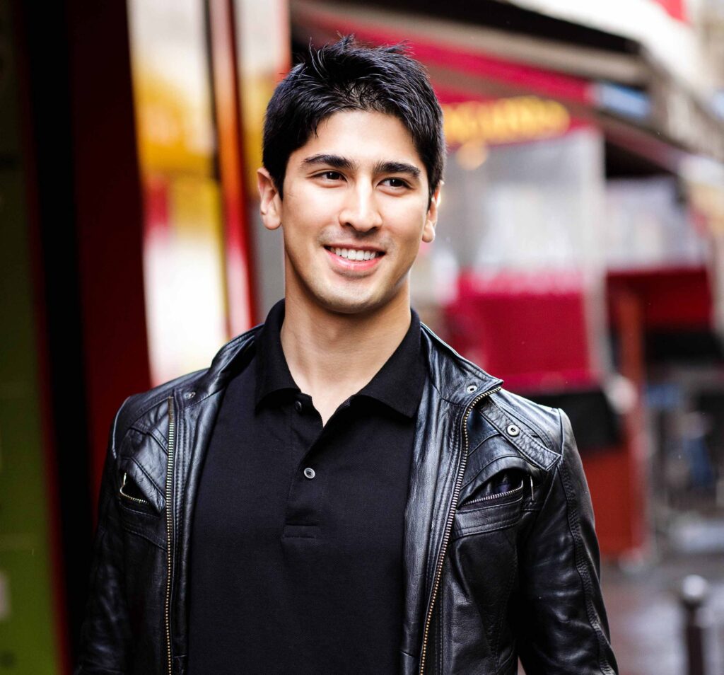 Portrait of BigBong with a black leather jacket in Paris by Denis Dumas